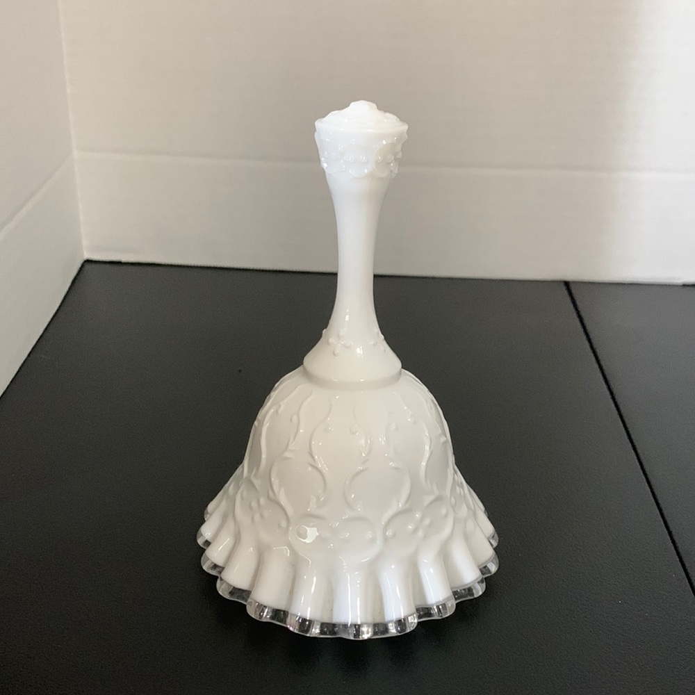 Fenton milk glass bell-clear rim on the bottom.